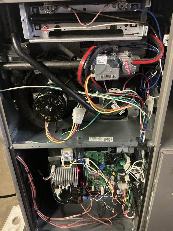 Completed scheduled Air Care Heating and Cooling recurring maintenance on residential furnace unit 4/102-5AHC. Performed comprehensive system inspection including visual examination of all internal components, electrical connections, gas valve assembly, blower motor operation, control boards, and heat exchanger. All wiring connections verified secure, burner assembly inspected, and system components documented with photographs for service records.