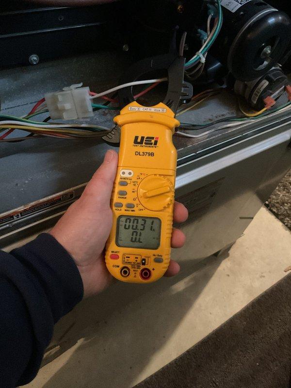 Completed annual furnace maintenance and tune-up on new unit as requested through membership program. Performed comprehensive system diagnostics using digital multimeter to verify proper electrical operation, measuring voltage at 240V and checking microamp readings at 0.031 BL. Inspected blower motor assembly, belt drive system, and all electrical connections. All components operating within normal parameters with no issues found.