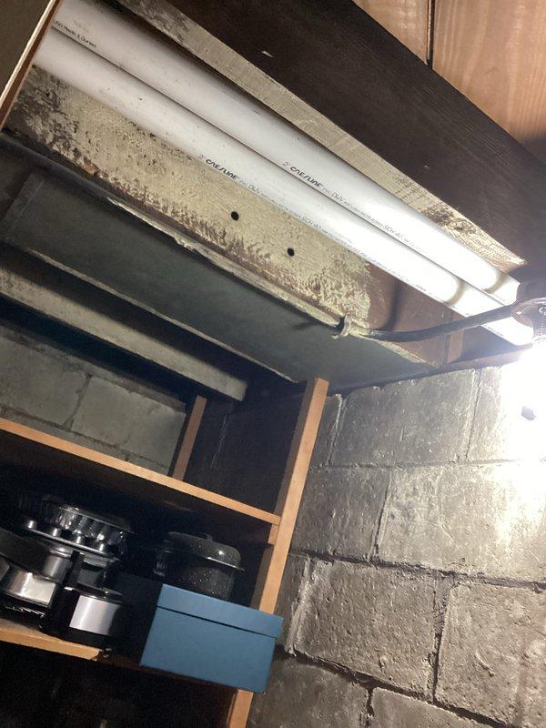 Completed full HVAC system installation including a 70,000 BTU furnace with rear discharge configuration and a 2-ton air conditioning unit. Installed humidifier system integrated with furnace for whole-home humidity control. Ran PVC venting through basement ceiling joists to code specifications. Positioned outdoor condensing unit against exterior wall with proper clearances, installed electrical disconnect box on siding, and completed all refrigerant line connections. Reconnected all ductwork and electrical systems. Obtained mechanical and electrical permits prior to installation. All equipment tested and operational upon completion.