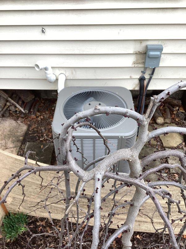 Completed full HVAC system installation including a 70,000 BTU furnace with rear discharge configuration and a 2-ton air conditioning unit. Installed humidifier system integrated with furnace for whole-home humidity control. Ran PVC venting through basement ceiling joists to code specifications. Positioned outdoor condensing unit against exterior wall with proper clearances, installed electrical disconnect box on siding, and completed all refrigerant line connections. Reconnected all ductwork and electrical systems. Obtained mechanical and electrical permits prior to installation. All equipment tested and operational upon completion.