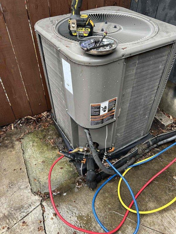Completed annual HVAC maintenance as part of membership program on 10-year-old furnace system. Performed comprehensive tune-up including inspection of outdoor condenser unit, refrigerant pressure testing using manifold gauges on all service ports, and system diagnostics. Unit operating within normal parameters with no issues found or repairs needed at time of service.