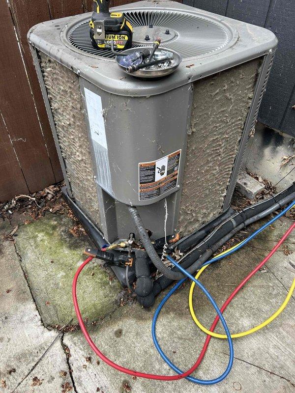 Completed annual HVAC maintenance as part of membership program on 10-year-old furnace system. Performed comprehensive tune-up including inspection of outdoor condenser unit, refrigerant pressure testing using manifold gauges on all service ports, and system diagnostics. Unit operating within normal parameters with no issues found or repairs needed at time of service.