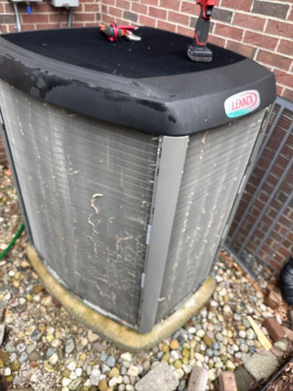 Completed annual cooling maintenance on Lennox air conditioning condenser unit. Performed comprehensive system inspection, cleaned condenser coils using customer-provided water hose to remove dirt and debris accumulation from exterior fins, checked refrigerant lines for proper insulation and connections, and verified unit operation. All components found to be functioning within normal parameters.