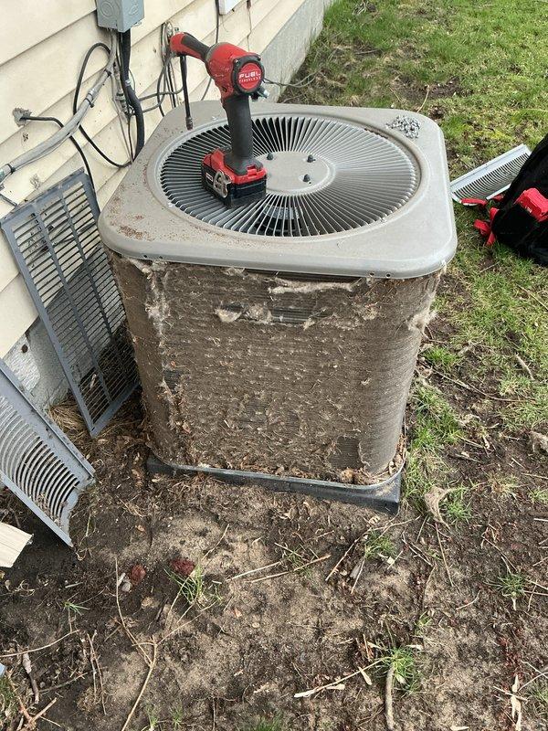Completed annual cooling maintenance on residential split system air conditioning unit. Performed comprehensive inspection of outdoor condenser unit, checked electrical connections and conduit, tested fan motor operation, and verified proper system function. Unit showed signs of weathering and exterior deterioration but all mechanical components operating within normal parameters at time of service.