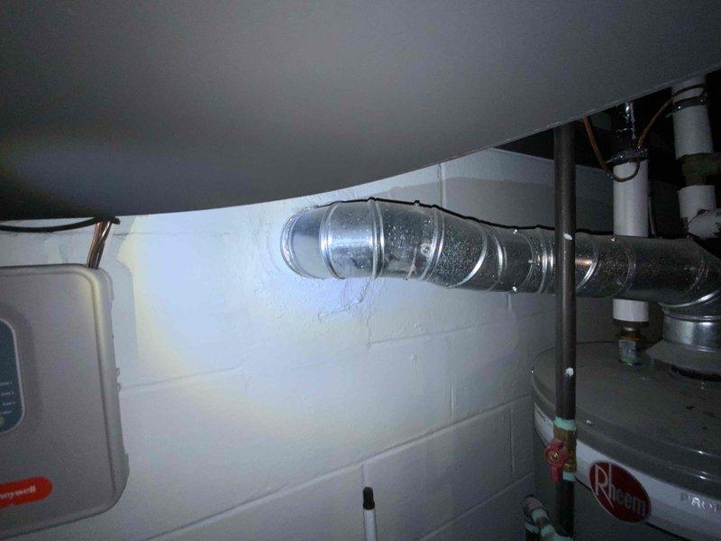 Conducted water heater replacement estimate for existing natural draft standard water heater in residential property. Current unit is operational but customer is exploring replacement options. Evaluated installation site in basement utility area and assessed existing plumbing configuration including gas supply lines and venting system. Discussed both standard tank-type and tankless water heater options with customer, who expressed openness to tankless technology pending pricing comparison. Documented current equipment specifications and utility room conditions including available clearances and access points for future installation. Provided comprehensive estimate covering both standard and tankless water heater replacement scenarios to allow customer to make informed decision based on budget and performance preferences.