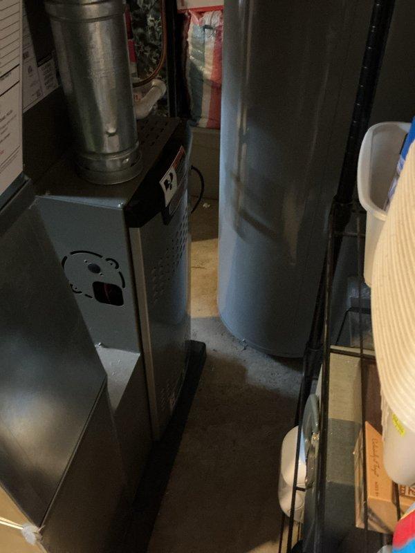 Completed routine HVAC maintenance inspection on residential furnace system and associated equipment in basement utility area. Replaced air scrubber bulb as requested and provided estimate for additional service needs. All equipment photographed and documented, system operating properly upon completion.