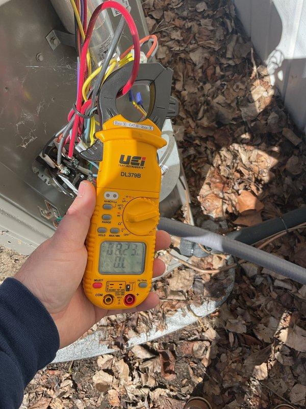 Performed comprehensive air handler maintenance as part of recurring preventive service agreement. Conducted electrical diagnostics using digital multimeter to verify proper voltage and amperage readings across system components, ensuring all electrical connections within outdoor unit were functioning within manufacturer specifications. Documented equipment condition through photographic records for service history tracking.