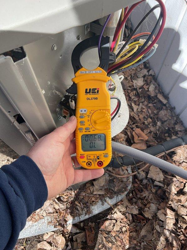 Performed comprehensive air handler maintenance as part of recurring preventive service agreement. Conducted electrical diagnostics using digital multimeter to verify proper voltage and amperage readings across system components, ensuring all electrical connections within outdoor unit were functioning within manufacturer specifications. Documented equipment condition through photographic records for service history tracking.