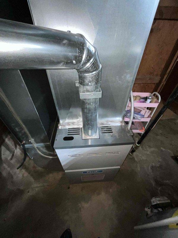 Conducted comprehensive full system HVAC estimate for residential property currently without air conditioning. Evaluated existing furnace/air handler installation in basement utility area and attic space, documenting current ductwork configuration including flexible aluminum ducting, rigid metal plenum connections, and condensate drainage system. Assessed structural considerations, existing infrastructure compatibility, and provided recommendations for complete heating and cooling system installation to meet customer's timeline of replacement within the next couple weeks.