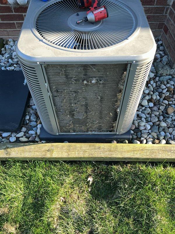Completed annual HVAC maintenance on Lennox outdoor condensing unit. Inspected system components, cleaned exterior housing which showed significant dirt accumulation and grime buildup, and evaluated condenser coils and fan operation. Noted filter replacement needed and evaporator pad showing wear spots requiring attention for optimal system performance.