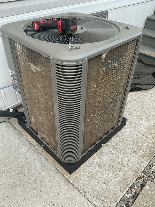 Completed annual cooling maintenance on residential AC condenser unit, including inspection of outdoor equipment and replacement of MERV 8 air filter at 15% capacity. Provided customer instruction on proper filter removal procedure for future maintenance.