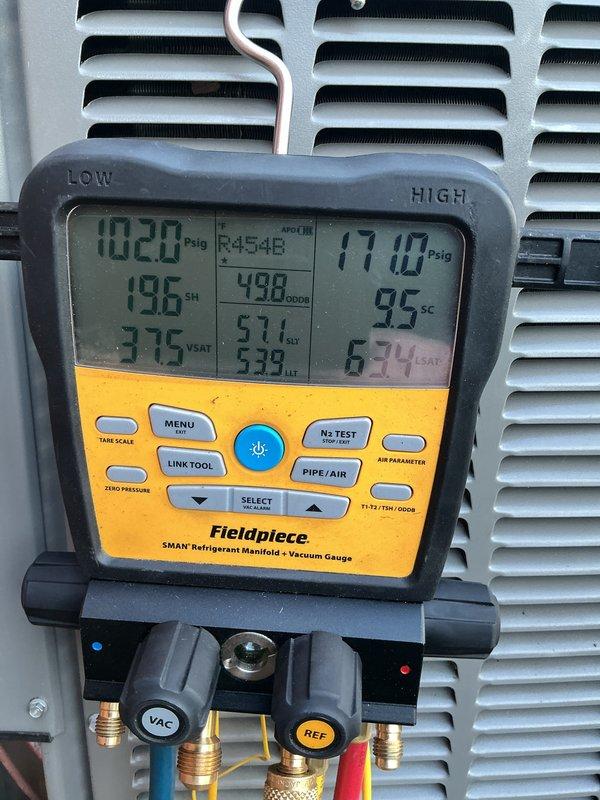 Completed annual HVAC maintenance tune-up on furnace and air conditioning system with no issues reported. Performed comprehensive inspection of heat exchanger coils, which were found to be in excellent condition with clean, intact fins and proper alignment. Conducted refrigerant system diagnostics using manifold gauges, recording pressures of 102.0 psig on low side and 171.0 psig on high side, with superheat at 19.6°F and subcooling at 9.5°F, confirming optimal system performance and proper refrigerant charge.