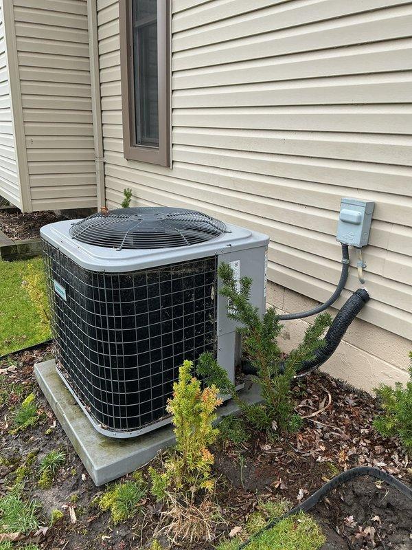 Completed annual cooling maintenance on residential split system air conditioning unit. Performed comprehensive system inspection including electrical testing of capacitor which measured 19.93 microfarads, verifying proper operation of compressor and condenser fan motor. Inspected outdoor condensing unit, refrigerant line set, and electrical disconnect box, confirming all components operating within normal parameters and system ready for cooling season.