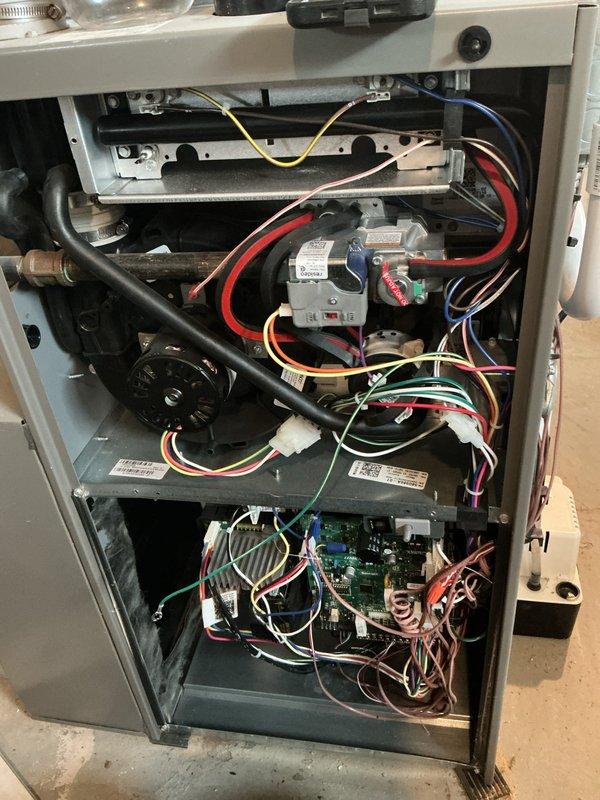 Completed comprehensive spring maintenance on one-year-old furnace and air conditioning system per homeowner request. Performed full AC tune-up including inspection of outdoor condensing unit, verified refrigerant temperatures reading 63.8°F at outdoor unit, and conducted thorough examination of furnace internal components including gas valve assembly, control board, blower motor, and all electrical connections. All systems tested and confirmed operating within normal parameters with no deficiencies noted.