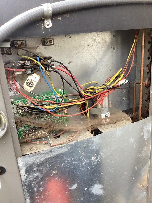 Completed annual preventive maintenance on rooftop cooling unit. Performed comprehensive inspection of electrical control panel, circuit boards, terminal connections, and refrigeration components. Documented existing conditions showing normal operational wear and interior dust accumulation. All system components functioning within normal parameters at time of service.