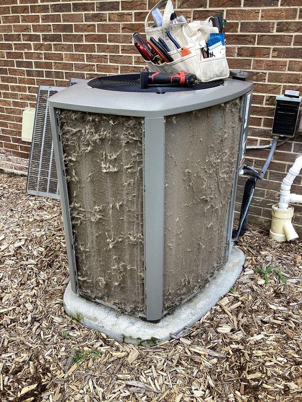 Completed annual HVAC maintenance service including inspection of outdoor condensing unit, replacement of furnace filters, and routine system check. Unit exterior showed signs of environmental soiling and was assessed for proper operation; all components functioning within normal parameters at time of service.