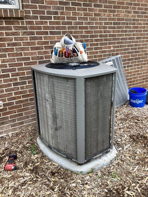 Completed annual HVAC maintenance service including inspection of outdoor condensing unit, replacement of furnace filters, and routine system check. Unit exterior showed signs of environmental soiling and was assessed for proper operation; all components functioning within normal parameters at time of service.
