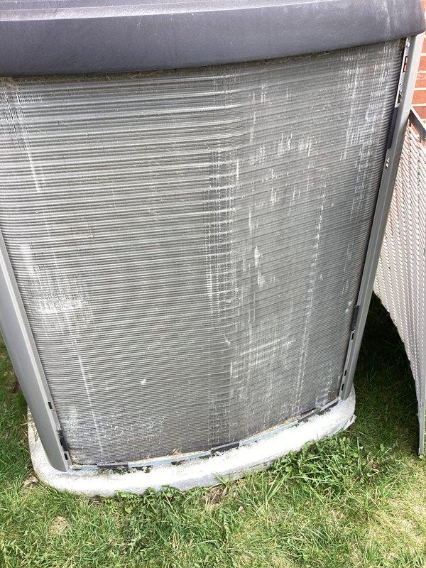 Completed annual cooling maintenance on residential air conditioning system. Performed comprehensive inspection of outdoor condenser unit including heat exchanger coils, electrical connections, and terminal blocks. Verified proper wire terminations, checked all electrical components for secure connections and proper grounding, and documented system condition with photographs. Unit operating within normal parameters.
