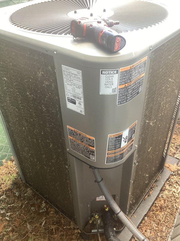 Completed scheduled air conditioning maintenance on residential split system. Performed comprehensive inspection of outdoor condenser unit and associated components including water heater connection points. Verified refrigerant line connections, checked electrical components, and inspected fan motor operation. All warning labels and manufacturer specifications confirmed visible and intact. System operating within normal parameters with no deficiencies noted at time of service.