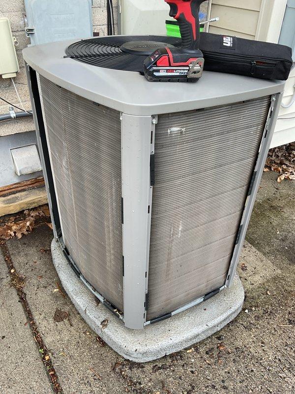 Performed routine preventative maintenance on residential air conditioning condensing unit. Completed visual inspection of cabinet, condenser coils, and fan assembly, noting normal weathering consistent with outdoor installation. Verified unit positioning on concrete pad and confirmed adequate clearances around equipment. All components found in satisfactory operating condition with no immediate service needs identified.