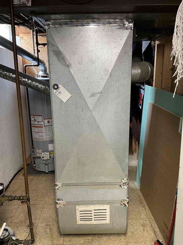 Conducted on-site assessment for complete HVAC system replacement of approximately 40-year-old furnace and air conditioning equipment. Evaluated existing air handler unit and ductwork configuration in basement mechanical room, documented current equipment specifications and installation layout. Prepared comprehensive replacement quote for new furnace and air conditioner system to address aging equipment concerns and improve system efficiency.