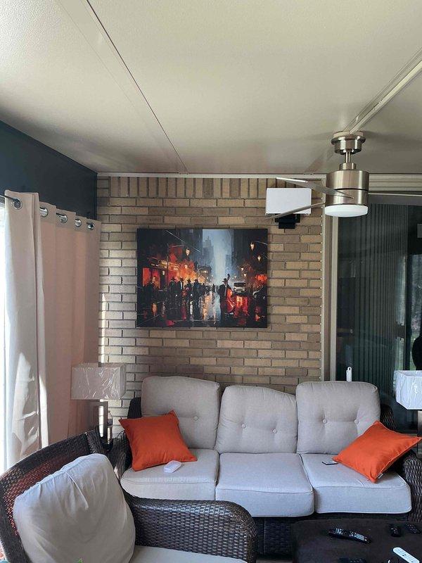 Completed estimate for ductless mini-split heat pump installation in enclosed patio area with no existing equipment. Assessed electrical panel capacity and available circuit breakers for new system power requirements. Evaluated patio space layout, including ceiling height for indoor air handler placement and exterior wall access for outdoor condenser unit installation.