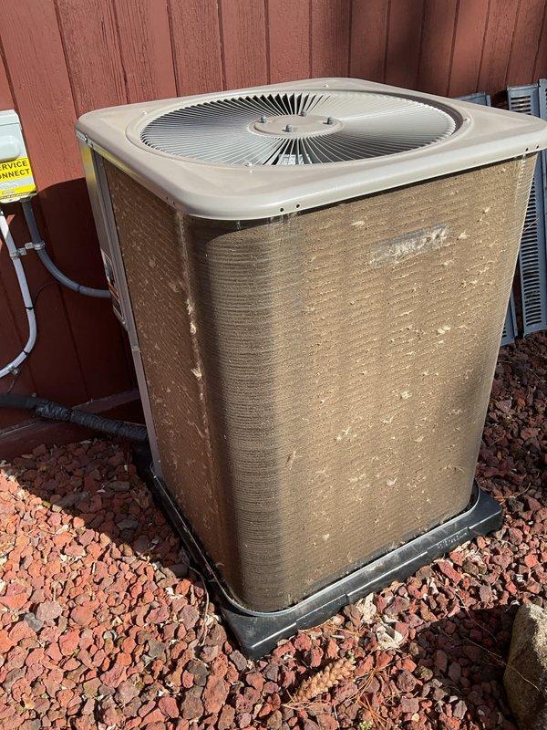 Completed scheduled Air Care Maintenance on residential air conditioning system. Performed comprehensive inspection of outdoor condenser unit, checked refrigerant pressures and temperatures using digital manifold gauges, verified system operation within manufacturer specifications, and documented equipment condition with photos showing unit positioned against perimeter fence with proper clearance and landscaping.