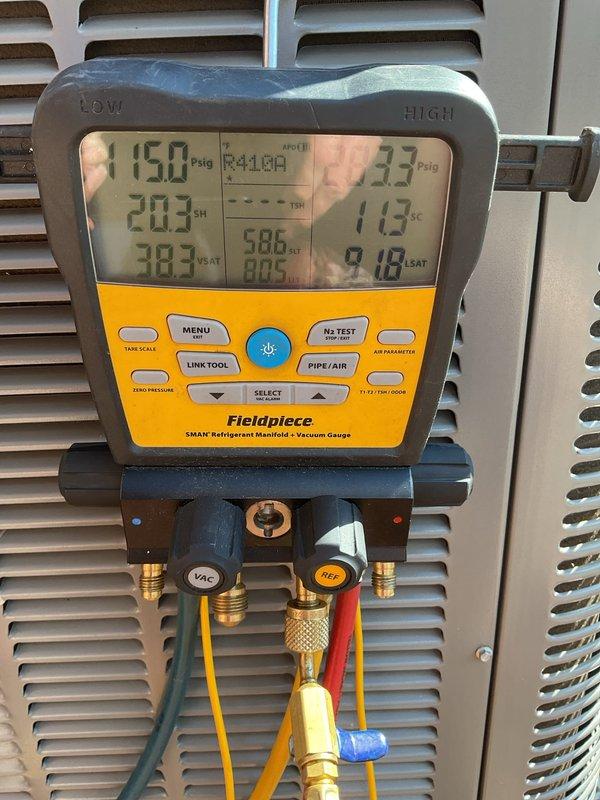 Completed scheduled Air Care Maintenance on residential air conditioning system. Performed comprehensive inspection of outdoor condenser unit, checked refrigerant pressures and temperatures using digital manifold gauges, verified system operation within manufacturer specifications, and documented equipment condition with photos showing unit positioned against perimeter fence with proper clearance and landscaping.