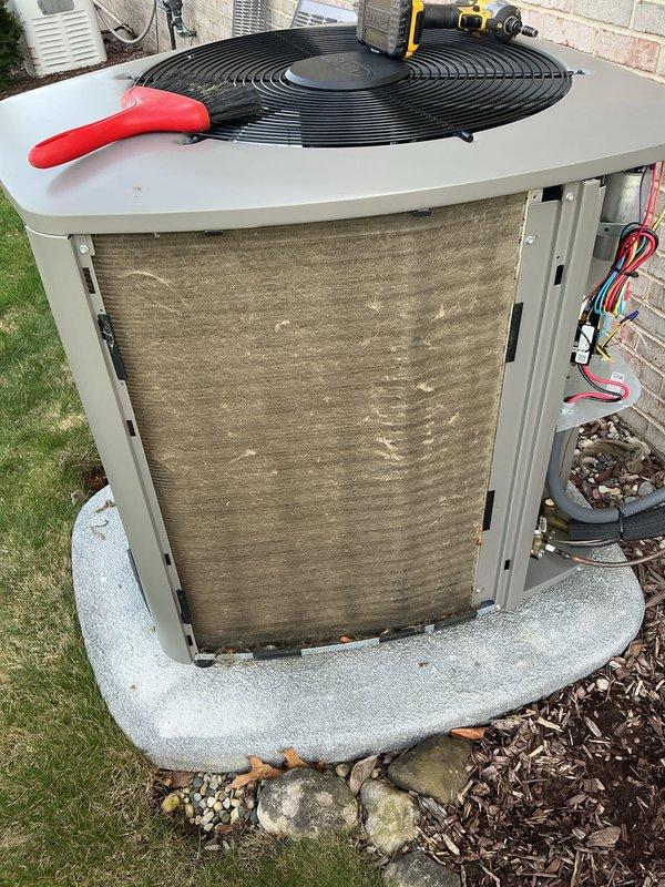# HVAC Maintenance Summary

Completed annual cooling maintenance on residential air conditioning system. Performed comprehensive inspection of outdoor condenser unit, including cleaning of coil fins which showed moderate dirt and debris accumulation. Replaced air filters as needed and addressed routine maintenance requirements to ensure optimal system performance for the upcoming cooling season.

# Detailed Work Performed

Arrived on site and performed scheduled annual cooling maintenance on residential split system air conditioner. Conducted thorough visual inspection of outdoor condenser unit, noting accumulation of dirt, debris, and organic material on condenser coil surfaces and surrounding area.

Removed top fan grille assembly to access internal components. Inspected fan motor, blades, and electrical connections for proper operation and signs of wear. Verified fan motor operation and checked for unusual noise or vibration. Cleaned condenser coil fins using appropriate cleaning me