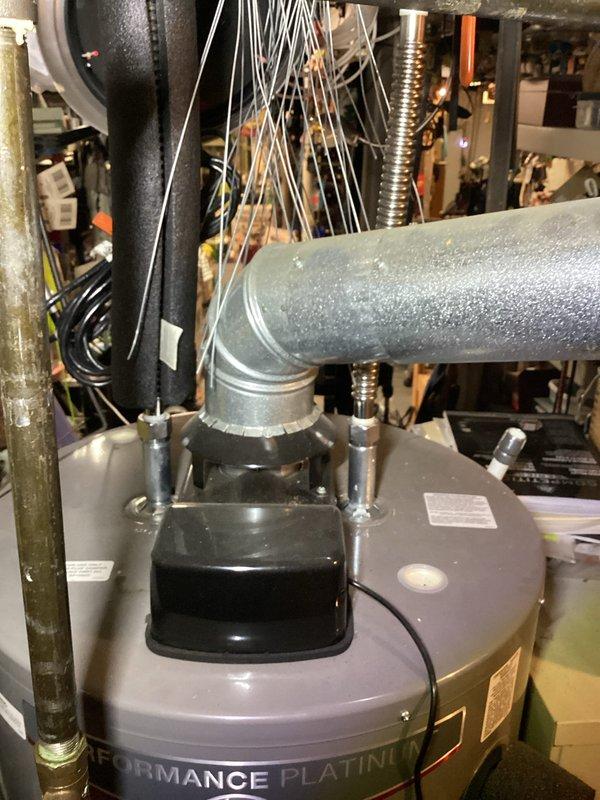 Responded to system lockout code indicating flammable vapors detected on Performance Platinum tankless water heater. Upon inspection, verified gas detector sensor was triggering false alarm causing unit shutdown. Performed diagnostic evaluation of combustion air intake system, venting configuration, and gas detector assembly. Tested ambient air quality in mechanical room and confirmed no actual presence of flammable vapors. Cleaned gas detector sensor, inspected electrical connections to control board, and reset system fault codes. Unit returned to normal operation with proper combustion and no further lockout conditions detected.