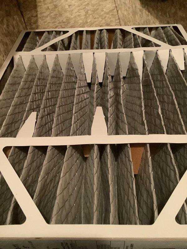 Completed annual cooling maintenance inspection on HVAC system. Removed and replaced heavily soiled air filter that showed significant accumulation of dust, dirt, and debris throughout the mesh media, which was restricting proper airflow. Installed new pleated air filter to restore system efficiency and indoor air quality.