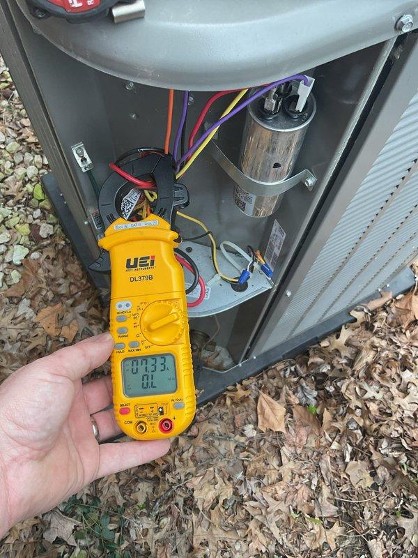 Attempted to perform scheduled Air Care Maintenance on outdoor condensing unit but was unable to complete service due to inclement weather conditions. Performed preliminary electrical diagnostics using digital multimeter to measure amperage and verify system operation on both outdoor unit and indoor air handler components. Advised rescheduling of complete ACM service when weather conditions improve to ensure proper system evaluation and maintenance procedures can be safely performed.
