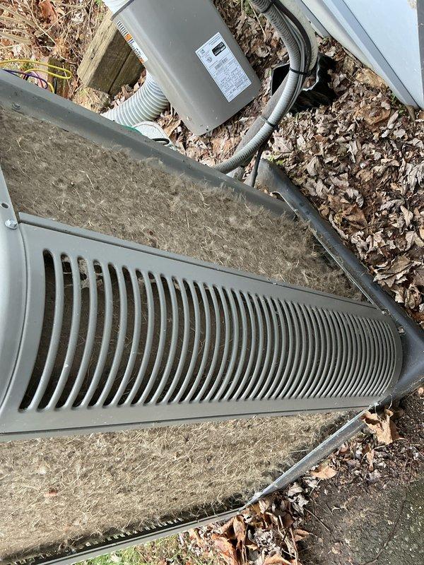 Completed annual cooling maintenance on residential outdoor condenser unit. Inspected system components, cleaned top grille ventilation slats that had accumulated dirt and debris, replaced air filters and evaporative cooling pads as needed, verified proper airflow through heat exchange system, checked electrical connections and disconnect box, and confirmed refrigerant lines and conduit were secure and in good condition.