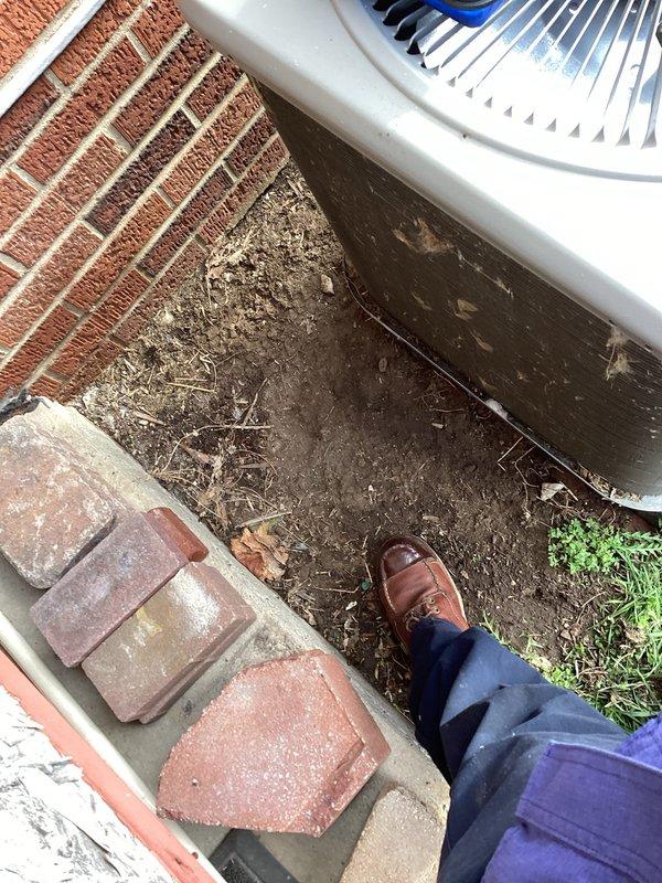 Completed comprehensive ComfortGuard Maintenance Package on residential outdoor air conditioning unit. Performed full system inspection including condenser coil examination, refrigerant pressure diagnostics using digital gauges, verification of proper fan operation, and assessment of drainage system functionality. Unit found to be operating within normal parameters with minor debris accumulation around base requiring attention to maintain optimal airflow and efficiency.