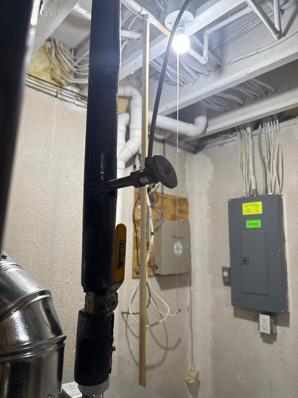 Installed 17-gallon whole-home humidifier unit integrated with existing forced-air furnace system in basement mechanical room. Connected humidifier to main supply ductwork with proper mounting and electrical hookup, ensuring optimal humidity distribution throughout the residence. Installation completed without requiring permits or rebate applications, with system tested and operational upon completion.