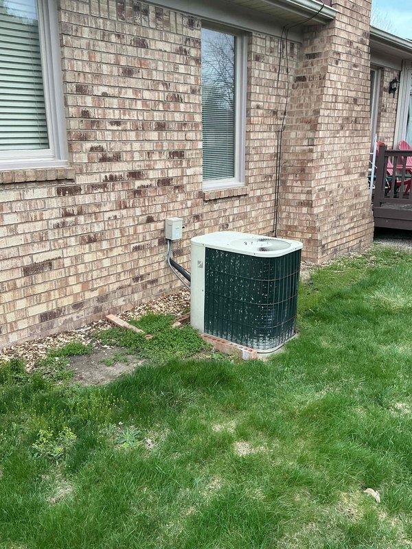 Completed comprehensive full system estimate for residential HVAC replacement. Evaluated existing 16-year-old furnace located in basement mechanical room and 16-year-old air conditioning condenser unit positioned on exterior pad against brick foundation. Documented current equipment condition, assessed ductwork configuration including flex connections and insulated supply runs, and photographed both indoor and outdoor components to provide accurate replacement recommendations for customer seeking seasonal system upgrade.