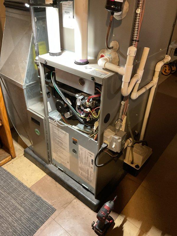 Completed scheduled air handler coil maintenance on residential HVAC system. Performed system inspection, replaced air filter and evaporator coil pad, and verified proper operation of all furnace components including blower motor, burner assembly, and ignition system.