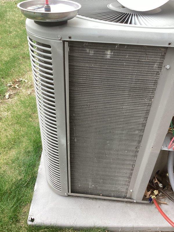 Completed routine annual maintenance on an 18-year-old central air conditioning system. Performed comprehensive tune-up including inspection of outdoor condensing unit, cleaning of condenser coils, verification of fan operation, and system performance testing. All components found to be operating within normal parameters, and unit was left in proper working condition for the cooling season.