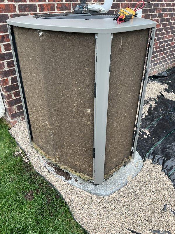 Completed routine ACM maintenance on residential outdoor condenser unit. Thoroughly cleaned heavily soiled filter screens and coils that had accumulated significant dust and debris, restoring proper airflow to the system. Unit tested and operating within normal parameters upon completion.