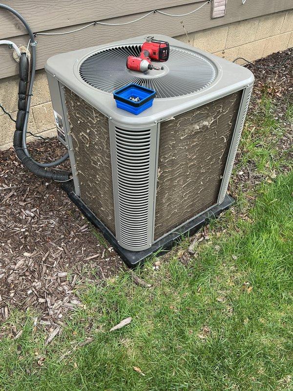 Performed scheduled preventive maintenance on residential Lennox air conditioning condenser unit. Conducted comprehensive system inspection including electrical connections, refrigerant pressures using manifold gauge set, and component functionality testing. Cleaned condenser coils, verified proper airflow through louver panels, and inspected refrigerant line set for signs of wear or damage. All components operating within manufacturer specifications with no issues identified during service visit.