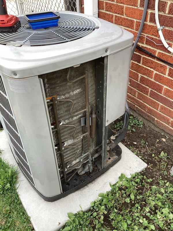 Completed ACM spot check on outdoor heat pump unit. Found dirty evaporator coils with significant dirt and grime accumulation throughout internal compartment. Verified system pressures and temperatures using refrigerant manifold gauge, confirming operational parameters. Identified filter replacement needed and recommended Residential Annual Contract renewal for continued preventive maintenance coverage.