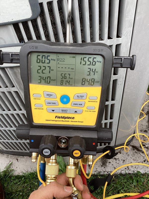 Completed ACM spot check on outdoor heat pump unit. Found dirty evaporator coils with significant dirt and grime accumulation throughout internal compartment. Verified system pressures and temperatures using refrigerant manifold gauge, confirming operational parameters. Identified filter replacement needed and recommended Residential Annual Contract renewal for continued preventive maintenance coverage.