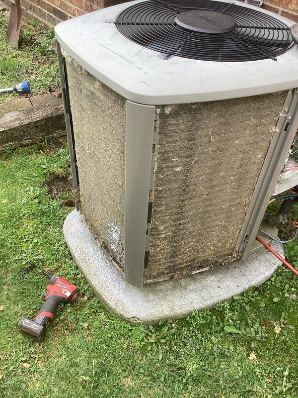 Completed annual preventive maintenance on residential air conditioning system. Unit exterior showed heavy dirt and debris accumulation on condenser coils and cabinet panels, requiring thorough cleaning. Filter replacement was identified as needed during inspection, and system was evaluated for proper operation and seasonal readiness.