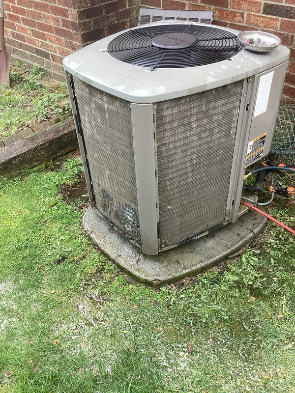 Completed annual preventive maintenance on residential air conditioning system. Unit exterior showed heavy dirt and debris accumulation on condenser coils and cabinet panels, requiring thorough cleaning. Filter replacement was identified as needed during inspection, and system was evaluated for proper operation and seasonal readiness.