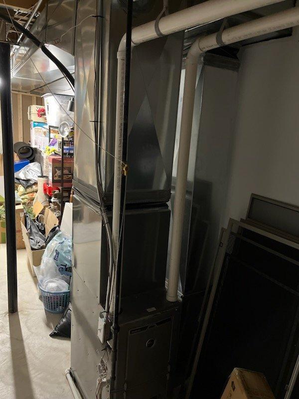 Completed annual cooling maintenance on residential HVAC system, inspecting air handler unit, ductwork, electrical connections, and condensate drainage lines. All components operating within normal parameters with no filter replacement required at this time.