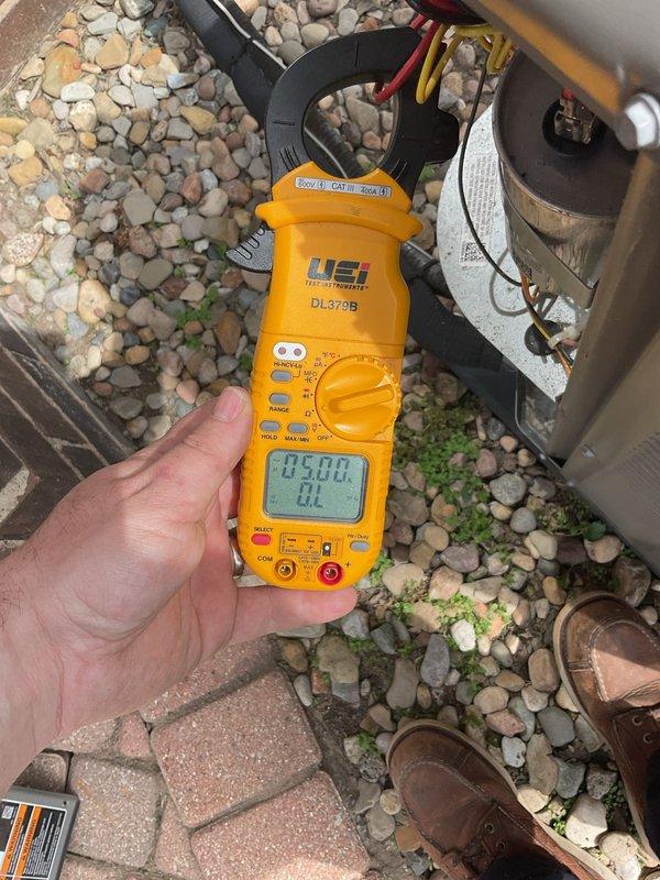 Completed annual cooling maintenance on residential air conditioning system. Performed electrical diagnostics using clamp meter to verify proper amperage draw and system performance. All components operating within manufacturer specifications at time of service.