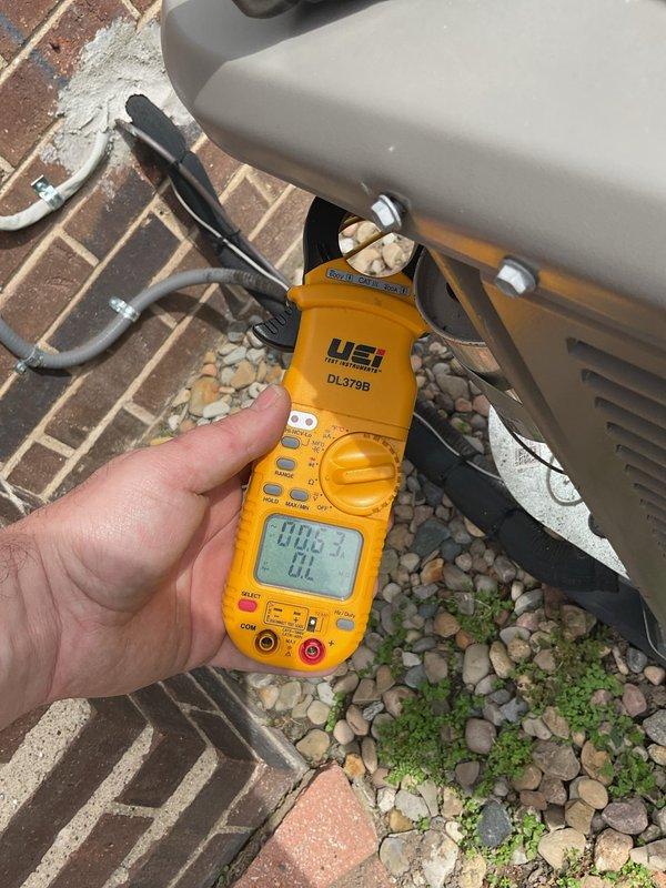 Completed annual cooling maintenance on residential air conditioning system. Performed electrical diagnostics using clamp meter to verify proper amperage draw and system performance. All components operating within manufacturer specifications at time of service.