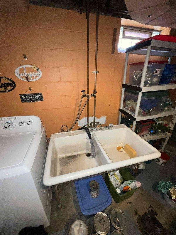 Provided estimate for furnace and air conditioning replacement on 30-year-old equipment currently located in basement. Existing forced-air heating system is operational but has reached end of expected service life. Assessed installation site conditions including ductwork configuration, electrical connections, and clearance requirements for new equipment placement in basement utility area.