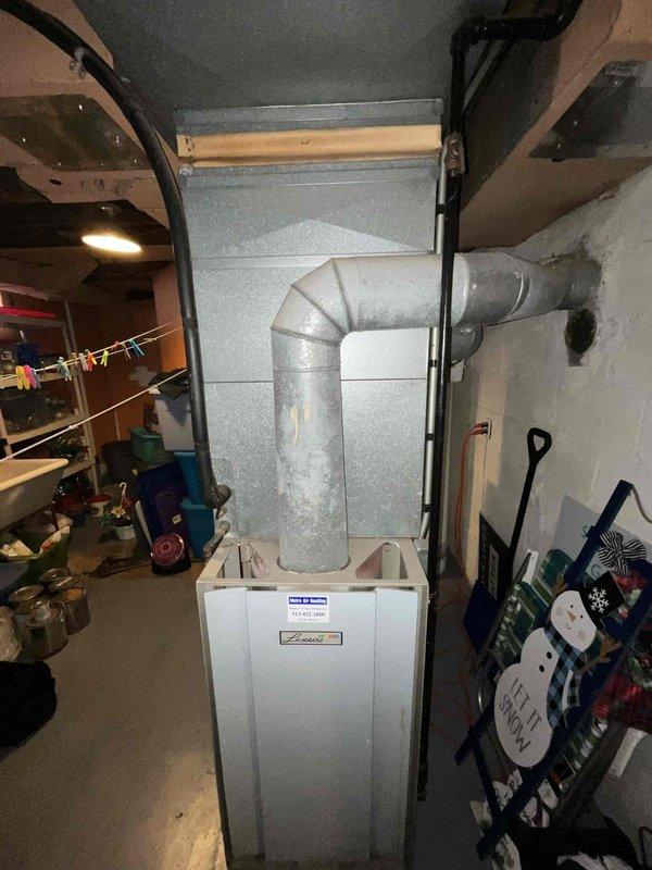 Provided estimate for furnace and air conditioning replacement on 30-year-old equipment currently located in basement. Existing forced-air heating system is operational but has reached end of expected service life. Assessed installation site conditions including ductwork configuration, electrical connections, and clearance requirements for new equipment placement in basement utility area.