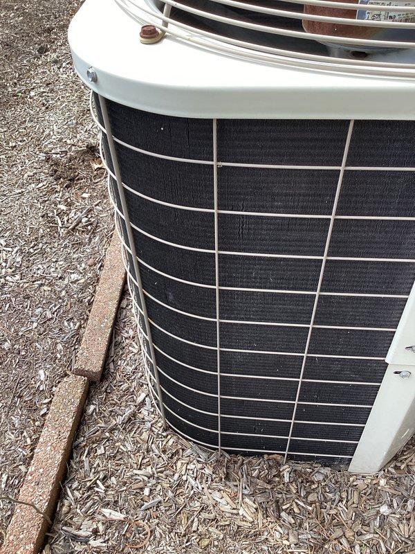 Completed annual preventive maintenance on residential split system air conditioning unit. Performed comprehensive inspection of outdoor condensing unit including coil condition assessment, electrical connections, refrigerant line integrity, and fan operation verification. Unit found in operational condition with normal outdoor weathering, all safety components intact and functioning properly.